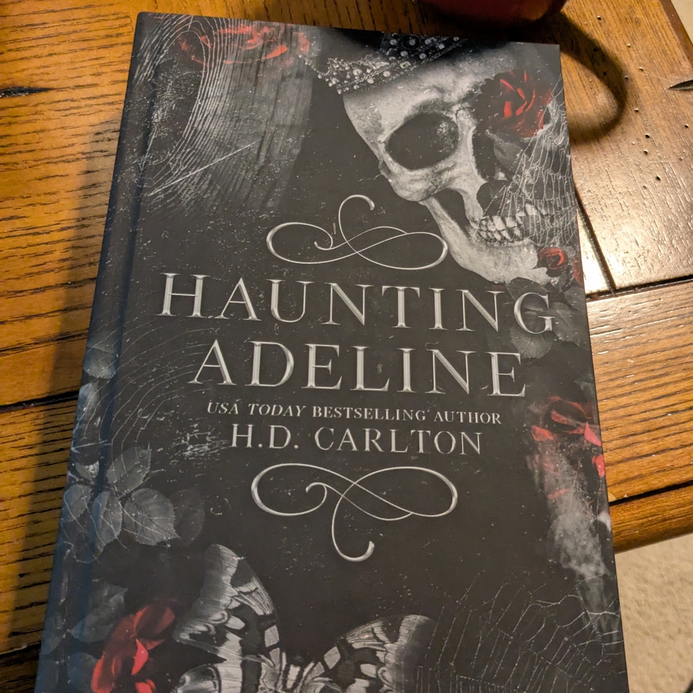 Haunting Adeline by H.D. Carlton - Black and Red Hardcover